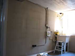 Laundry area before installing dryer vent ducting