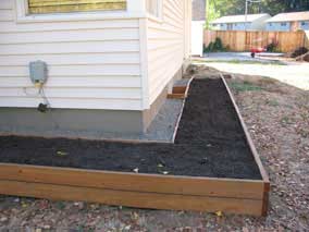 Front planting bed all filled in