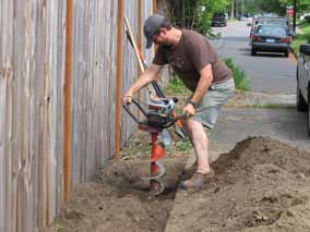 Nate running the post auger with no goggles, dust mask, earplugs, etc.