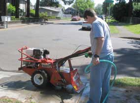 Nate washes the rototiller