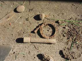 Various metal things dug out of flowerbed