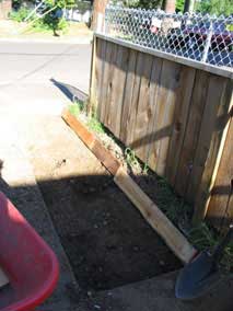 Flowerbed after digging down existing rocky clay soil