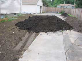 Topsoil pile after delivery (7.4 cubic yards)