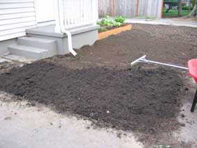 Topsoil on front yard after grading