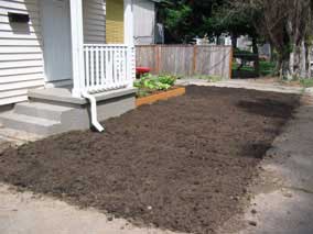 Front yard with topsoil laid out and graded