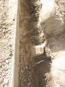 Buried concrete discovered in trench digging