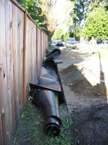 Bamboo barrier jumbled in and on trench