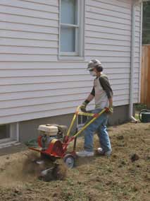 Tilling the west lawn