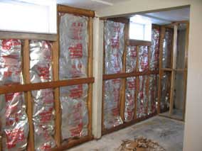 Knotty pine all removed from south wall of basement