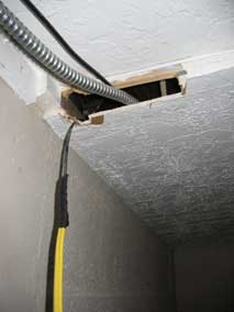 Fishing electrical wire through basement ceiling