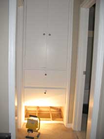 Built-in cabinets between bath and bed rooms