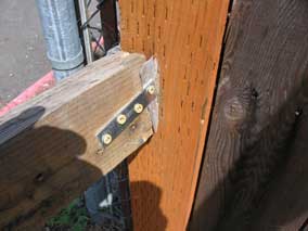 Bottom rail secured with mending plates and screws