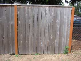 Repaired section of fence