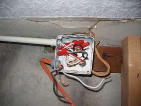 Wiring for back basement wall heater disconnected (remaining wires go to two heaters on ground floor)