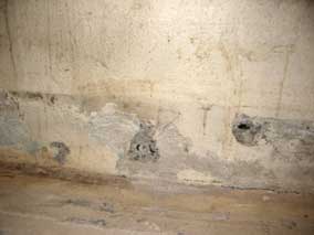 Holes in concrete wall to be patched