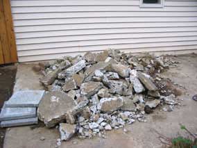 Pile of broken concrete before hauling it off