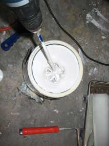 Stirring Drylok paint with drill attachment