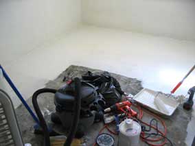 Painting floor of back basement room