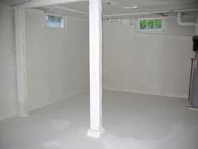 Back room of the basement after priming and painting with Drylok