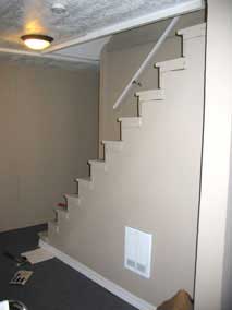 Basement stairs before guardrail