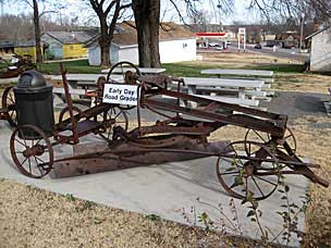 Horse- or mule-drawn road grader at Arcadia Round Barn