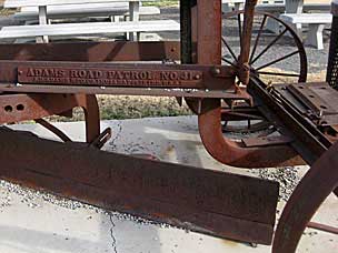 Horse- or mule-drawn road grader at Arcadia Round Barn