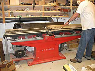 Frank runs the white oak slab on the jointer