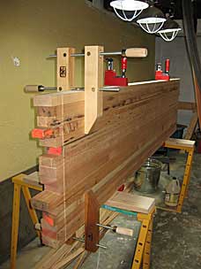 Turning the workbench top over to finish trimming the end