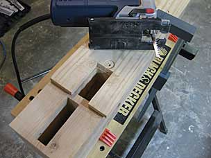 Using jigsaw to trim sides of leg mortise