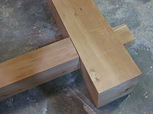 Through tenon on long stretcher in mortise