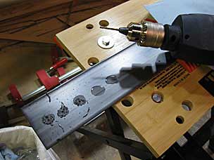 Drilling holes for a dowel plate