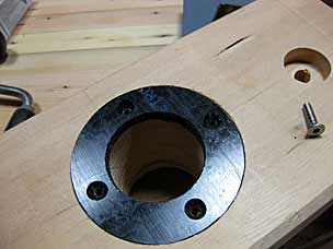 Delrin bushing for vise screw (subsequently replaced with oak)