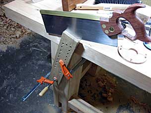 Sawing cheek of tenon on parallel guide