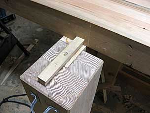 Sliding dovetail rail with countersunk screw