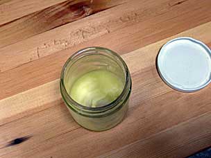 Beeswax paste in glass jar