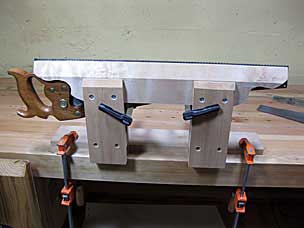 Saw vise after reshaping ends of jaws to allow handsaw handles to fit