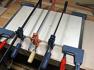 Gluing solid wood edge to plywood platform for shooting board