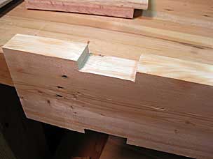 Notches in sawbench top for legs