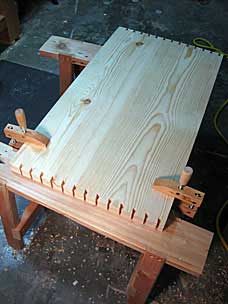 Tool chest long side panels with dovetails sawed and chiseled