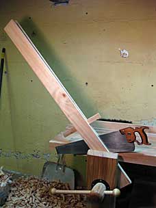 Resawing board for lower tool chest tray