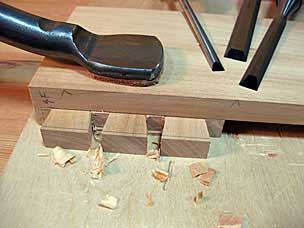 Paring dovetails on side board of tray