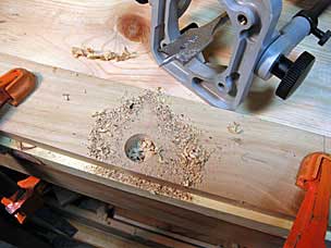 Drilling finger hole for middle tool chest tray