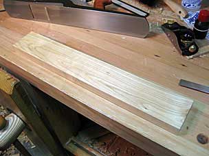 Board prepared to resaw for middle tool chest tray runners