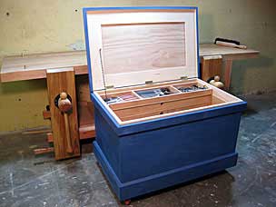 Tool chest open in front of workbench