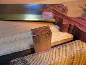 Preparing to saw dovetail on top rail