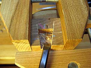 Using skew chisel to clean up dovetail socket