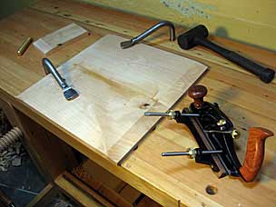 Preparing to plane long-grain bevels on underside of nightstand top