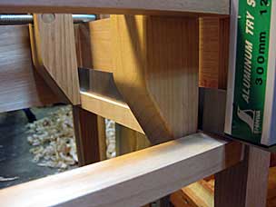 Checking drawer runner for square during glue-up