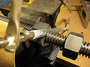 Cutting acme threaded rod with hacksaw