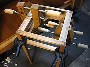 Clamping drawer guides in nightstand